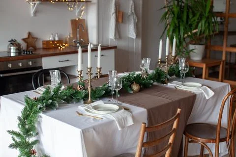 New Year's table setting. Waiting for Christmas. Stock Photos