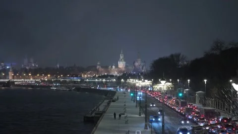 New Year's Winter traffic jam on the embankment against the background of the Stock Footage 166360473
