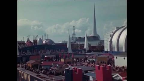 NEW YORK - 1939 - Visitors stream into booths and rides at the New York World’s Stock Footage 327744662