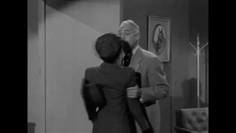 NEW YORK - 1952 - A man makes a plan with his co-workers daughter. Stock Footage 340653232