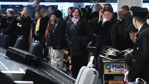 NEW YORK - 1990s - Customs officers search a plane at JFK International Airport Stock Footage 340657853