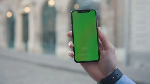 NEW YORK - April 5, 2018: Close up hands young man holding a smartphone with Stock Footage 112157712