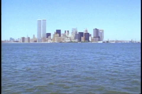 NEW YORK CITY, 1982, QE2 World Cruise at the Battery, World Trade Towers distant Stock Footage