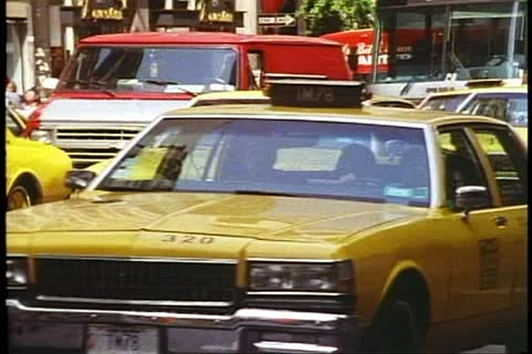 NEW YORK CITY, 1994, Taxicabs on Fifth Avenue bunched together, busy Stock Footage
