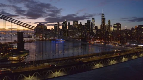 New York City aerial drone downtown skyline buildings sunset evening bridge Stock Footage