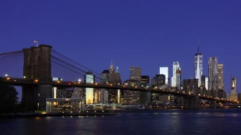 New York City Brooklyn Bridge and lower Manhattan skyline morning sunrise time l Stock Footage