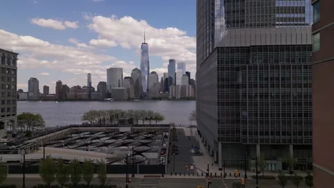 New York city. camera move back through the park and jersey city dontown Stock Footage 240689133