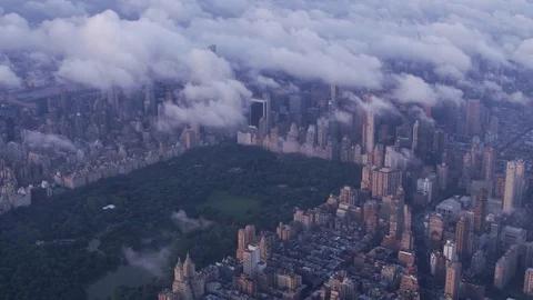 New York City circa-2017, Aerial view of Manhattan with low clouds at sunrise.  Stock Footage