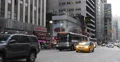 New York City Commuters Commuting Bus Passing Taxi Yellow Cab Rush Hour Busy NYC 4k or 4k+ Resolution