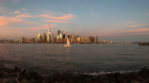 New York City Downtown Sunset with a Sailingboat Stock Footage
