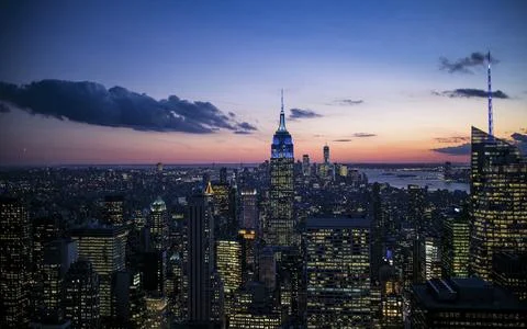 New York City. Manhattan downtown skyline with illuminated Empire State Building Stock Photos