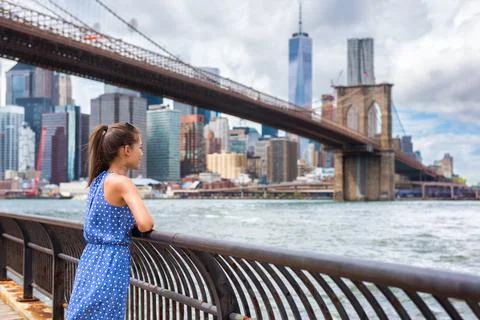 New York city NYC summer travel tourist woman enjoying view of Manhattan skyline Stock Photos
