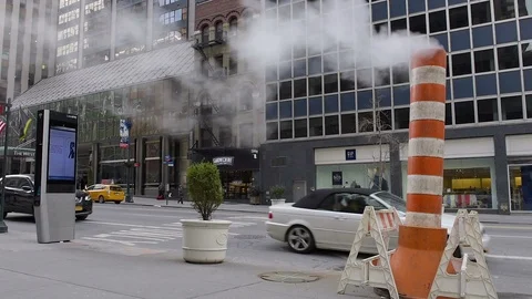 New York City Steam Stack on Windy Day with Street Traffic in Background Stock Footage 85615214