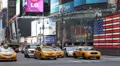 New York City Times Square Driving Car Traffic Taxi Passing Yellow Cab Bus Day HD Footage