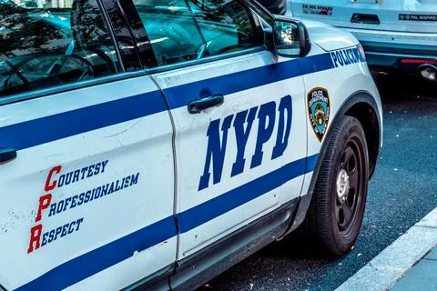New York City, USA, November 2021. Police car parked along Manhattan street Stock Photos