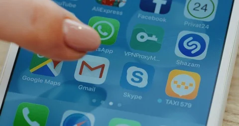 New York - December 10, 2017: Female finger choosing a Gmail app on the screen Stock Footage 86462943