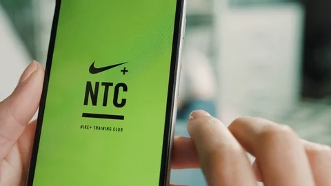 New York - March 10, 2017: Woman hands get ready to the running, turn on nike Stock Footage 75876676