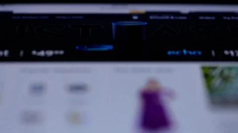 New York - May 06, 2017: Touching tablet display to search film on Amazon Prime Stock Footage 80217446