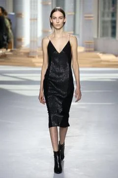 NEW YORK, NY - FEBRUARY 18: A model walks the runway at the Boss Womens fashi Stock Photos