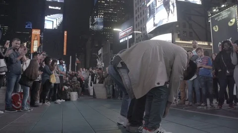 New York Package 27 | Athletic person jumping over crowd of people (slow motion) Stock Footage 115529468