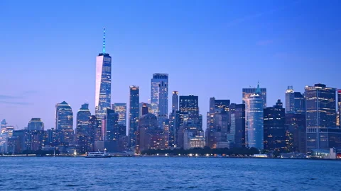 New York skyline with multiple lights in the windows. View on the cityscape from Stock Footage 316557720