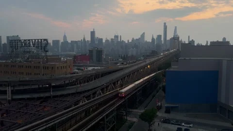 New York Skyline from Queens, begin of Summer Stock Footage 243401295