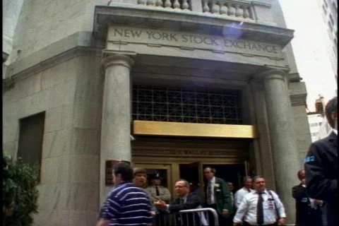 New York Stock Exchange, exterior, side door with people, low shot Stock Footage
