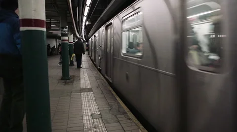 New York subway stops at platform Stock Footage 49360925