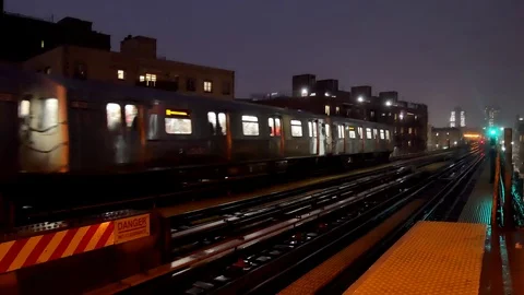 New York Subway Train Arrives Into Station and Creates Electrical Spark Stock Footage