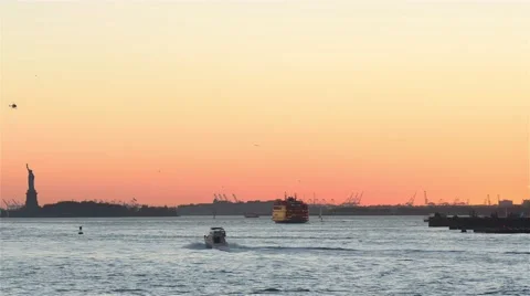 New York Upper Bay at sunset. An Iconic Statue of liberty in the corner. Video stock 62529311