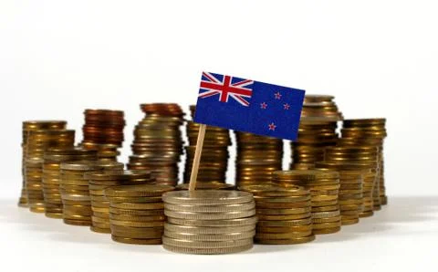 New Zealand flag waving with stack of money coins Stock Photos