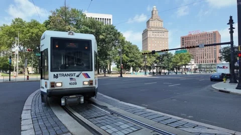 Newark Light Rail Crossing at Broad Street on a Sunny Day Stock Footage 281194507