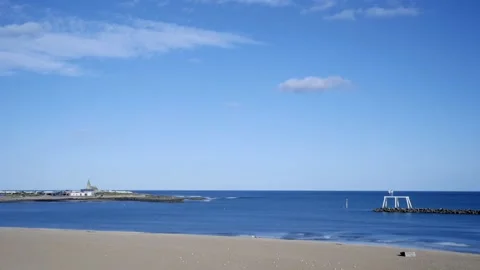 Newbiggin point and statue timelapse Stock Footage 165301917