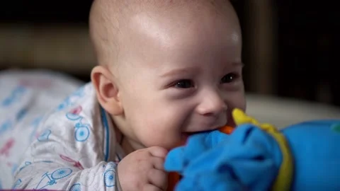 Newborn Active Baby Cute Smiling Teethless Face Portrait Early Days On Stomach Stock Footage 199666053