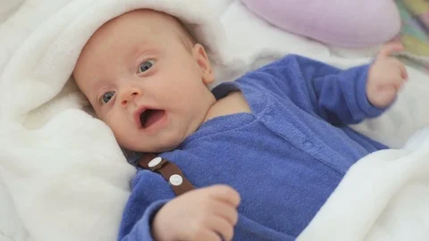 The newborn is awake in the crib Stock Footage 87130823