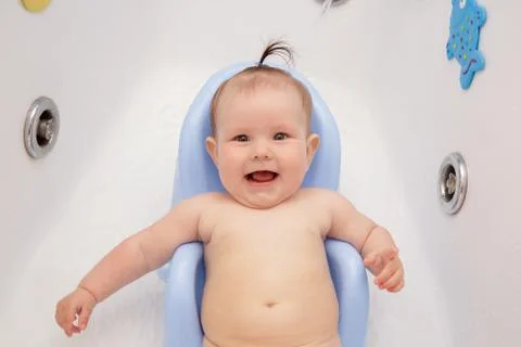 Newborn baby bathe and swim Stock Photos