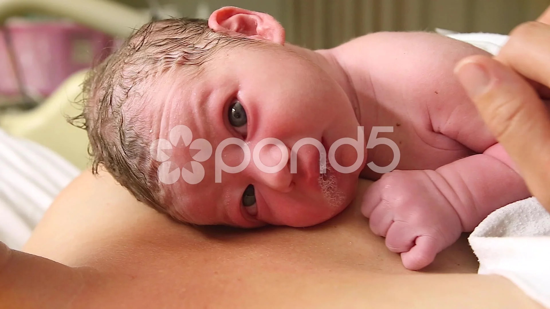 newborn baby boy with blue eyes