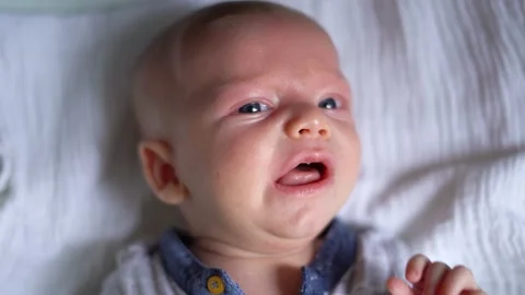 A newborn baby crying on a changing table 스톡 동영상 166363698