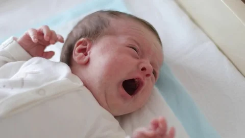 Newborn baby is crying (close-up) Stock-Footage 76079241