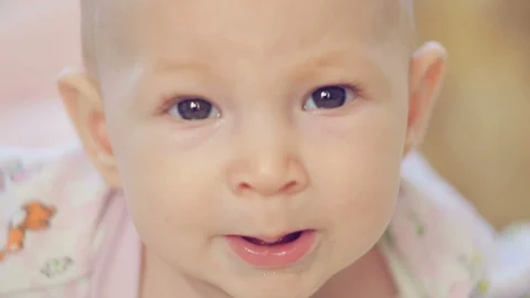 Newborn baby looking at the camera Stock Footage 108310244
