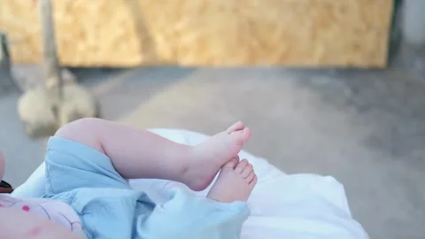 Newborn baby's feet close up Stock Footage 277558322