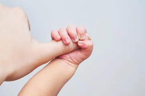 Newborn baby's hand Stock Photos