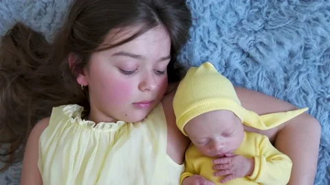 Newborn cute lovely sisters and brother Stock Footage 201937053