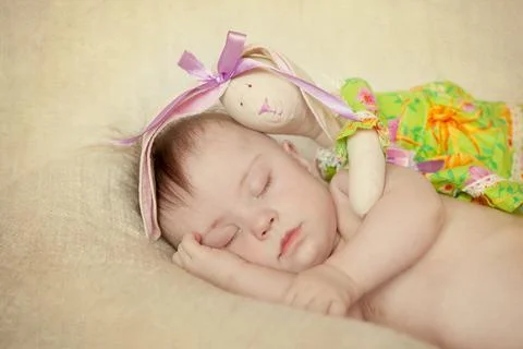 Newborn with Down syndrome sleeping Stock Photos