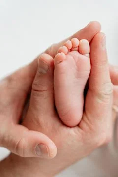 Newborn feet close up Stock Photos