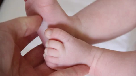 Newborn Feet Stock Footage 33828710