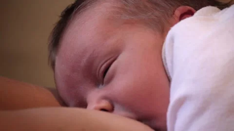 Newborn infant breastfeeding Stock Footage 59124439