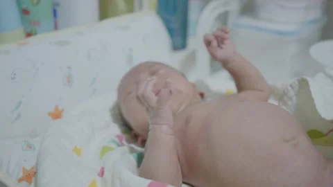 Newborn Infant Peacefully Sleeping on Soft Blanket Stock Footage 318629189