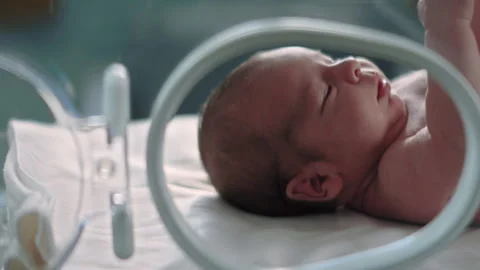 Newborn inside a Crib in the Hospital Stock Footage 283071315