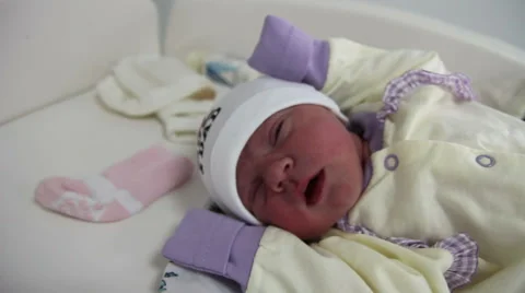 Newborn looks at camera Stock Footage 47211099